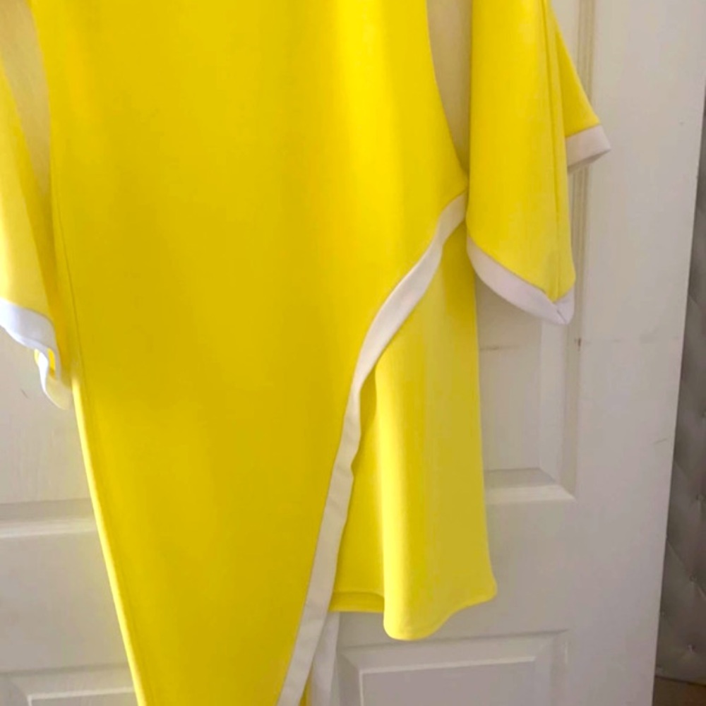Light yellow with white trim asymmetrical dress
